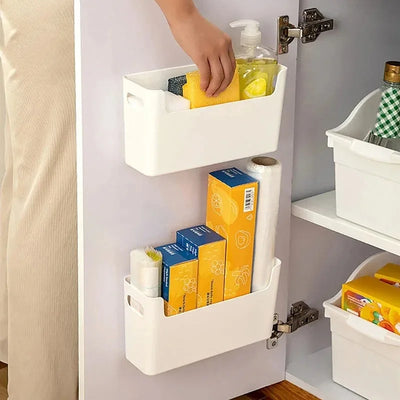 Kitchen cabinets classified and organized into storage boxes for dishes seasoning bottles drawers and storage boxes