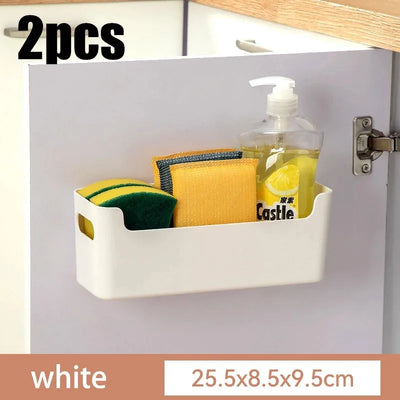Kitchen cabinets classified and organized into storage boxes for dishes seasoning bottles drawers and storage boxes